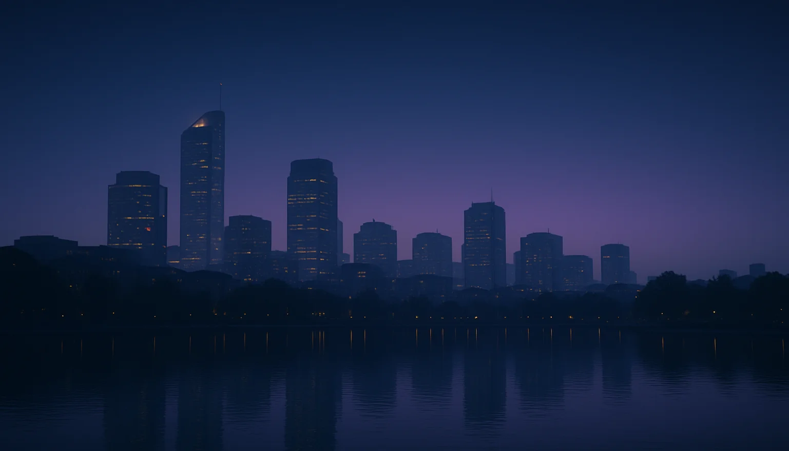 Twilight city skyline of lit skyscrapers reflected in misty lake, purple hazy sky.