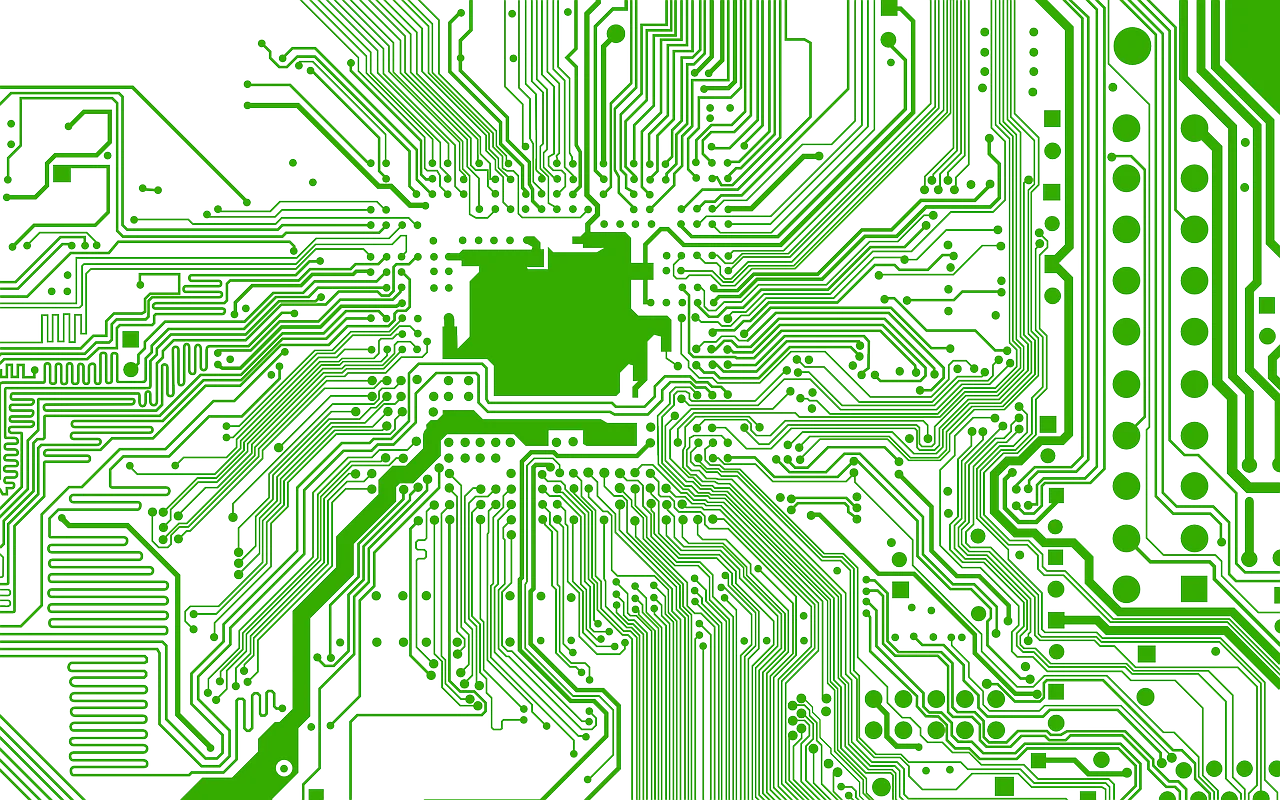 Grüne Leiterbahnen auf einer Computer-Motherboard-Platine.